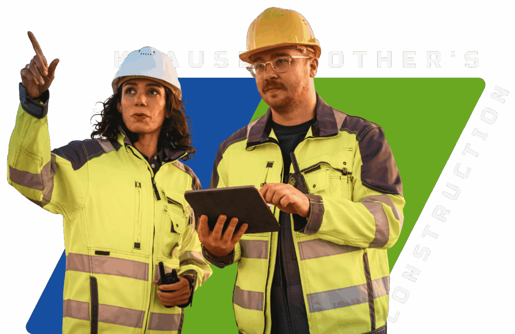 Construction workers discussing plans with tablet.